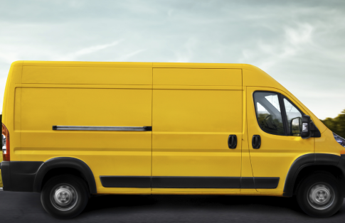 Courier moving freight in yellow van